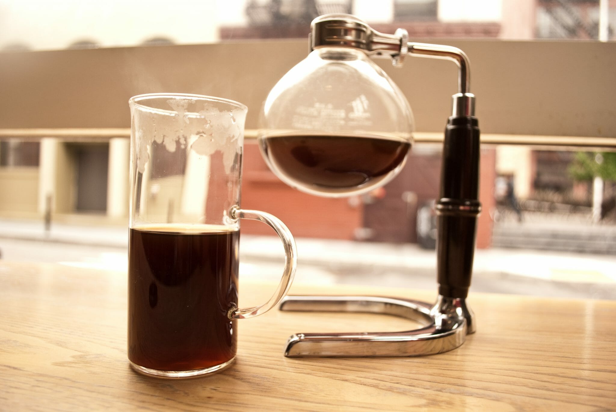 photo of siphon-brewed coffee on a windowsill in San Francisco